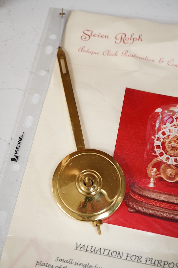 A Victorian skeleton clock under dome, cast iron base, 34cm total height